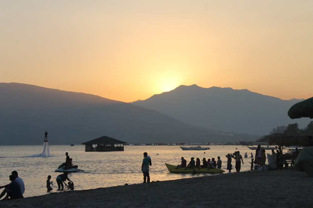 Mountains, sunset, banana boats, jet ski,  hoverboard,  restaurant in the middle of the sea.